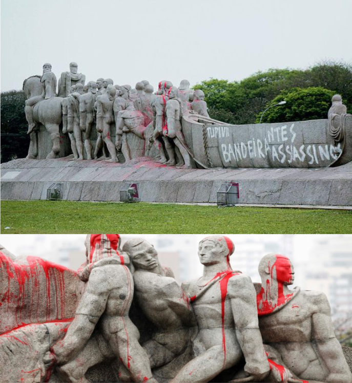 Pichação no Monumento às Bandeiras, com uso de tinta vermelha e frase “Bandeirantes Assassinos” (São Paulo, 2013) Pichação no Monumento às Bandeiras, com uso de tinta vermelha e frase “Bandeirantes Assassinos” (São Paulo, 2013)